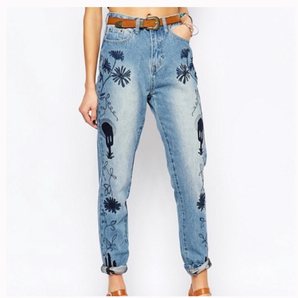 High rise side button embroidered mom jeans.